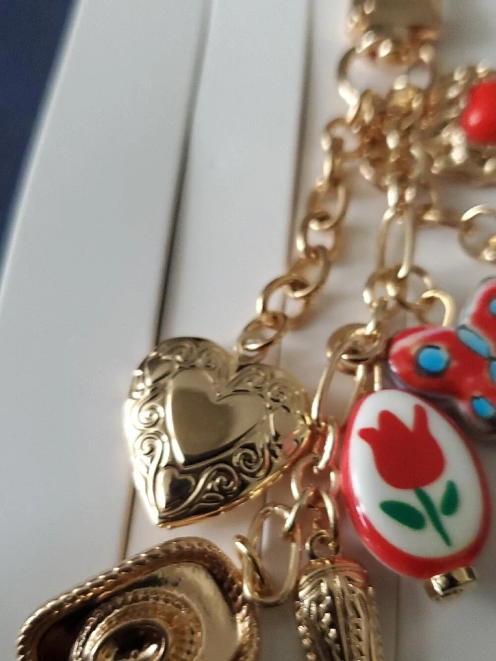 Lane Bryant Gold-Tone Charm Keychain with Red and Blue Accents